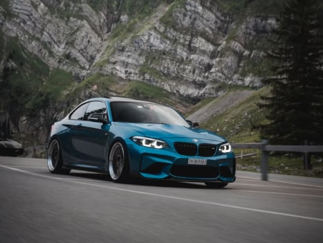bmw m2 on street.png