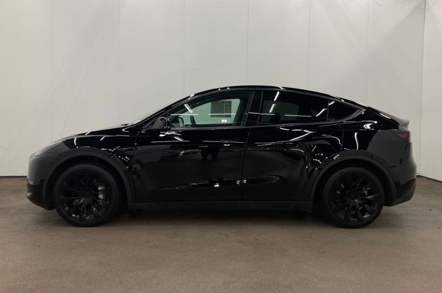 Used 2023 Tesla Model Y Long Range with VIN 7SAYGAEEXPF835059 for sale in Kansas City