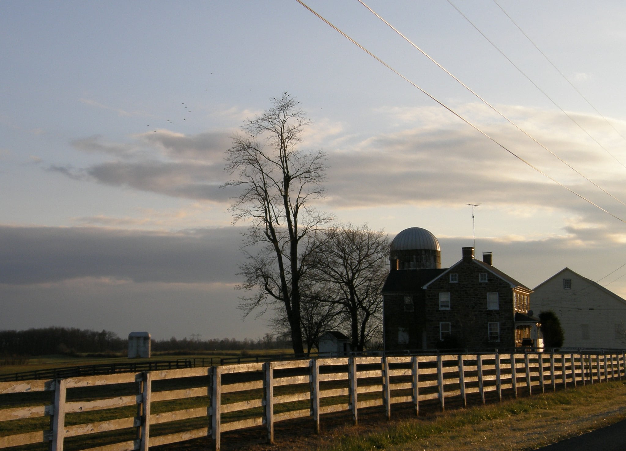 Scenic country drive past a farmhouse near Hanover, PA.jpg