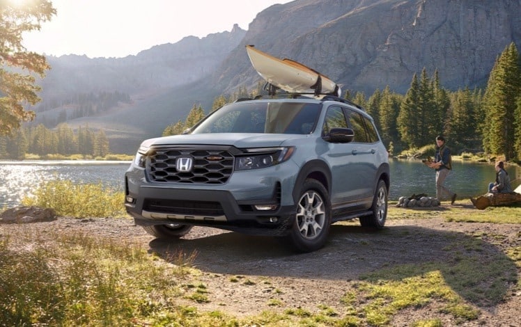 2024 Honda Passport hauling a canoe.jpeg