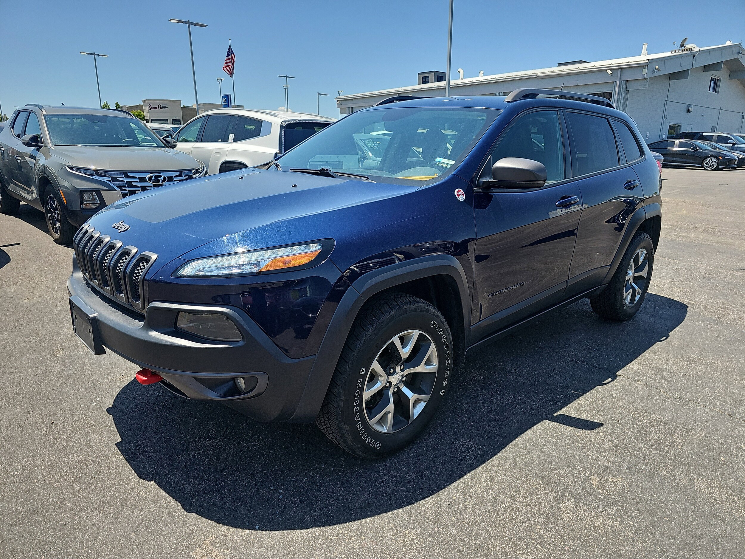 Used 2015 Jeep Cherokee Trailhawk with VIN 1C4PJMBSXFW703046 for sale in Centennial, CO
