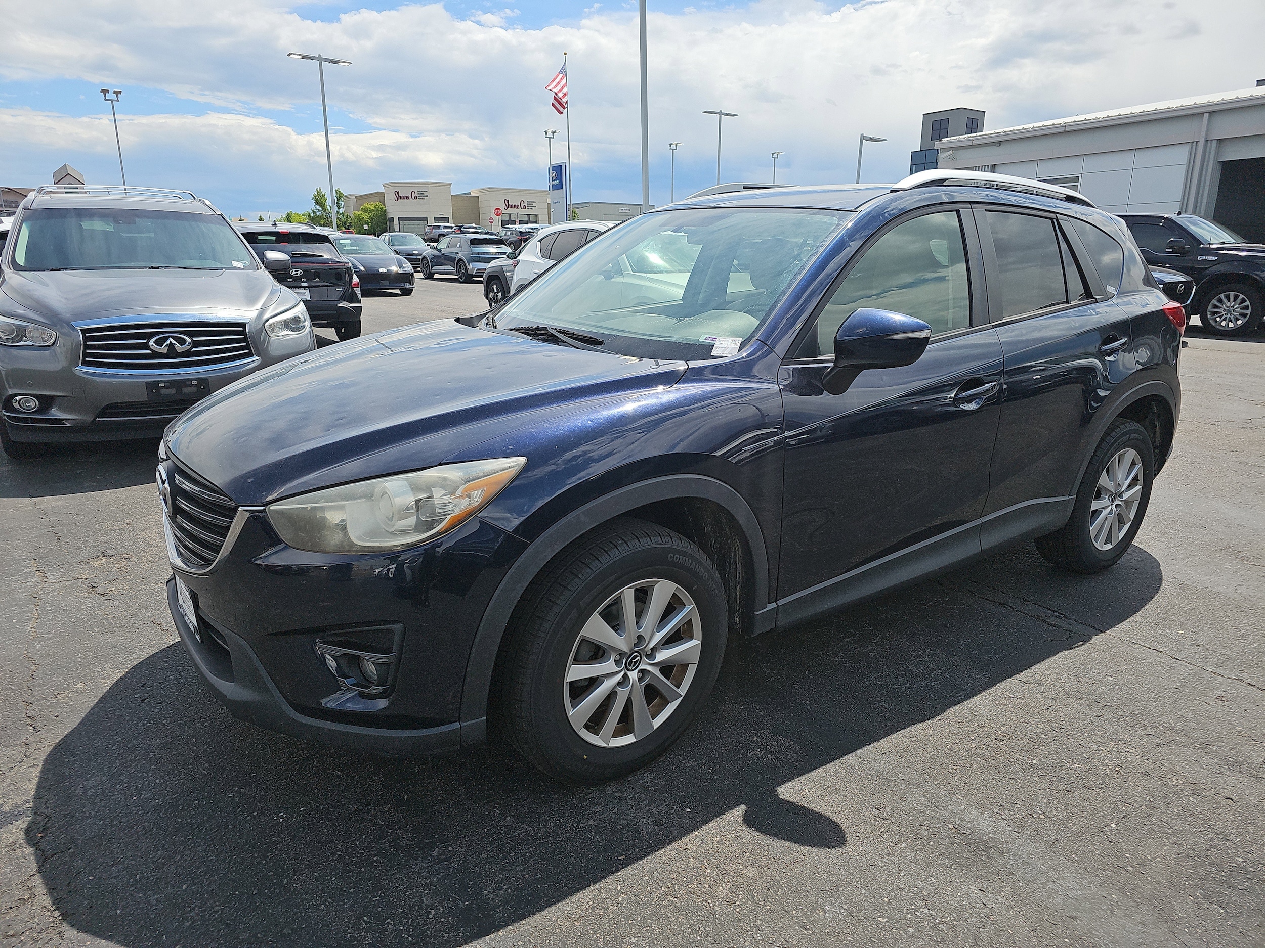 Used 2016 Mazda CX-5 Touring with VIN JM3KE4CY9G0654757 for sale in Centennial, CO