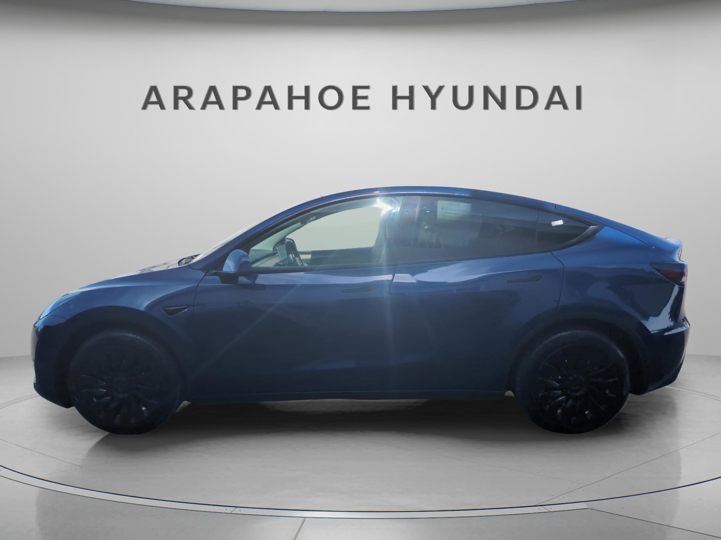 Used 2023 Tesla Model Y Long Range with VIN 7SAYGAEE9PF931085 for sale in Centennial, CO