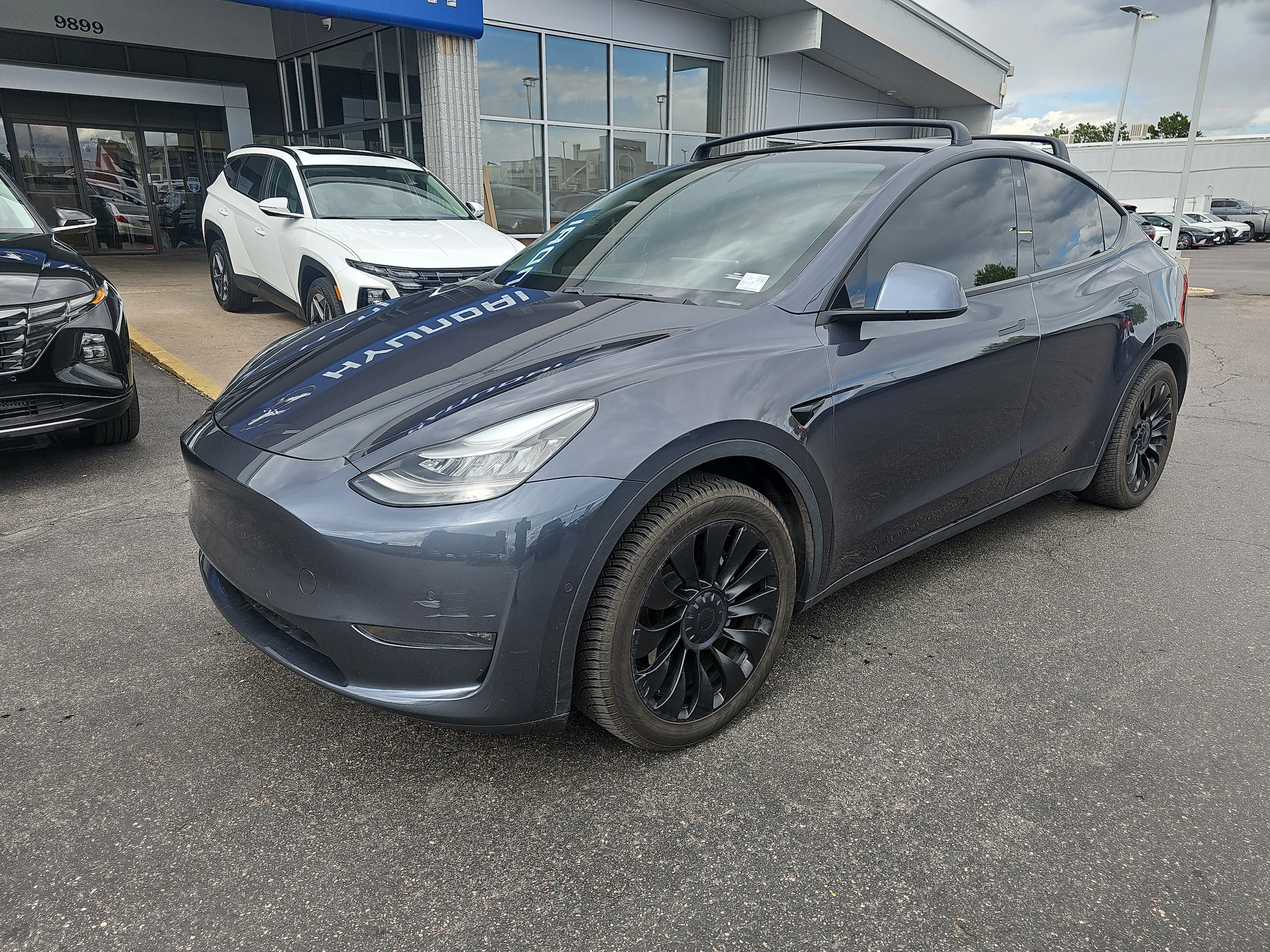 Used 2020 Tesla Model Y Long Range with VIN 5YJYGDEE0LF052048 for sale in Centennial, CO