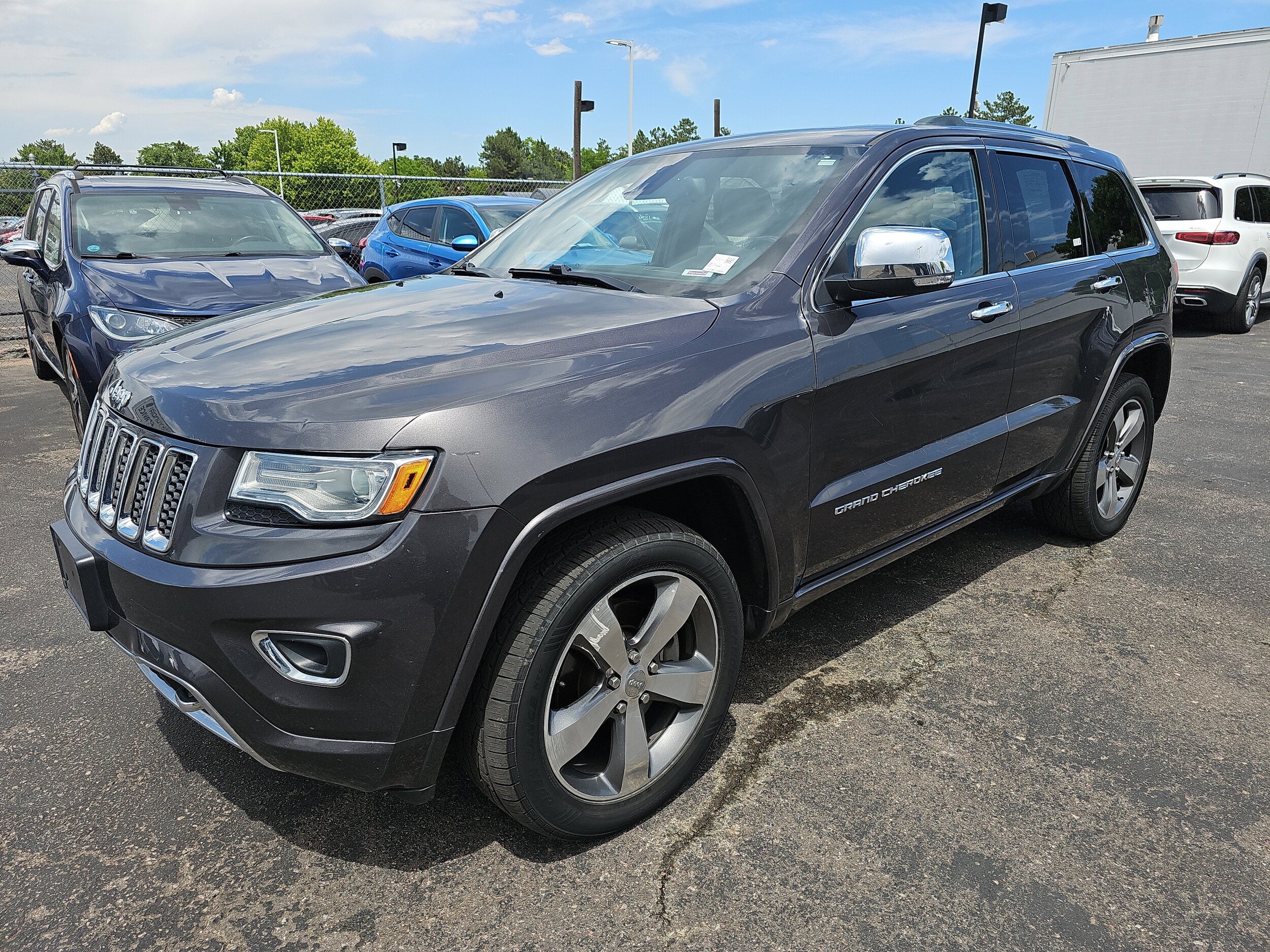 Used 2015 Jeep Grand Cherokee Overland with VIN 1C4RJFCM0FC618254 for sale in Centennial, CO