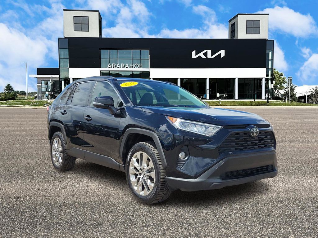 Used 2019 Toyota RAV4 XLE Premium with VIN JTMA1RFV9KJ023847 for sale in Centennial, CO