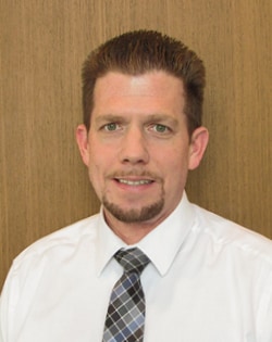 Staff member JIM BUCKNER from ID_036f52de1eef
