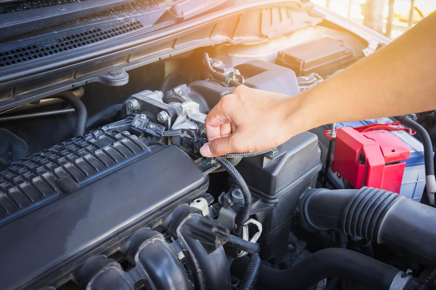 mechanic fixing engine