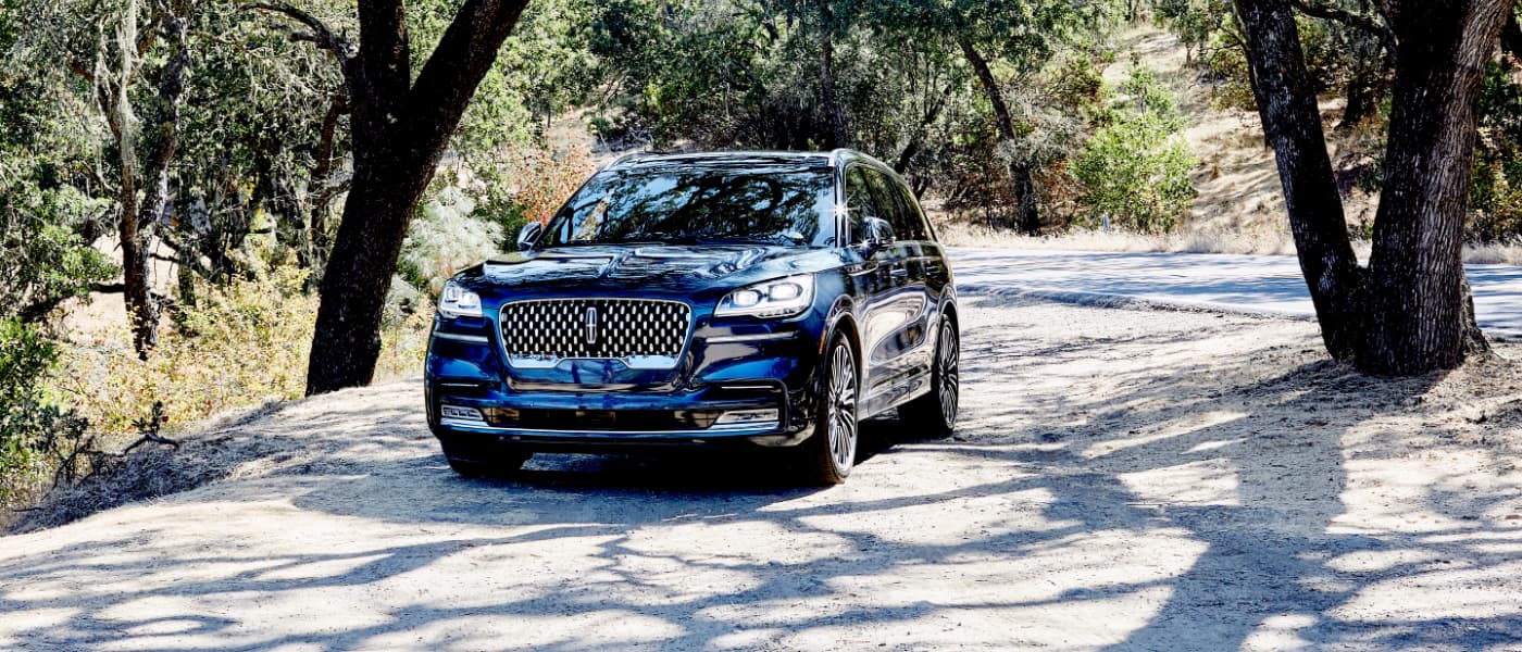 2020 Ford Lincoln Aviator parked outside in woods