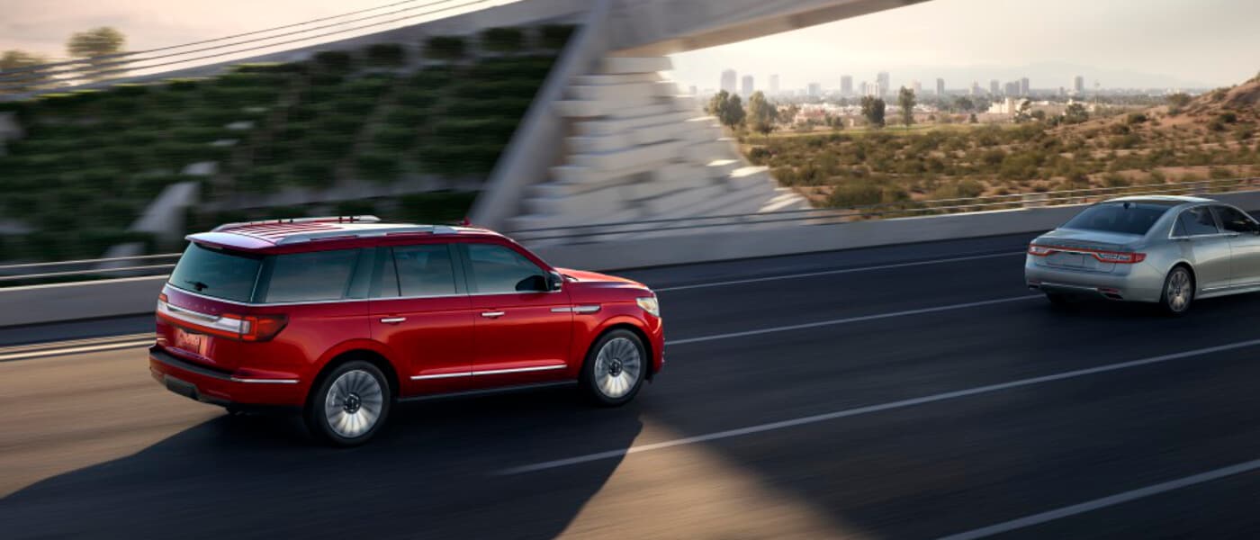 2019 Lincoln Navigator driving under a bridge
