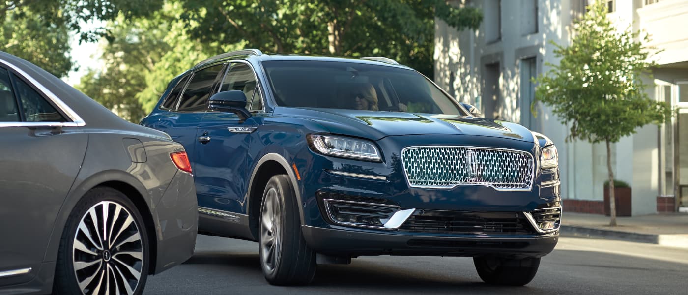 2020 Lincoln Nautilus with women driving 
