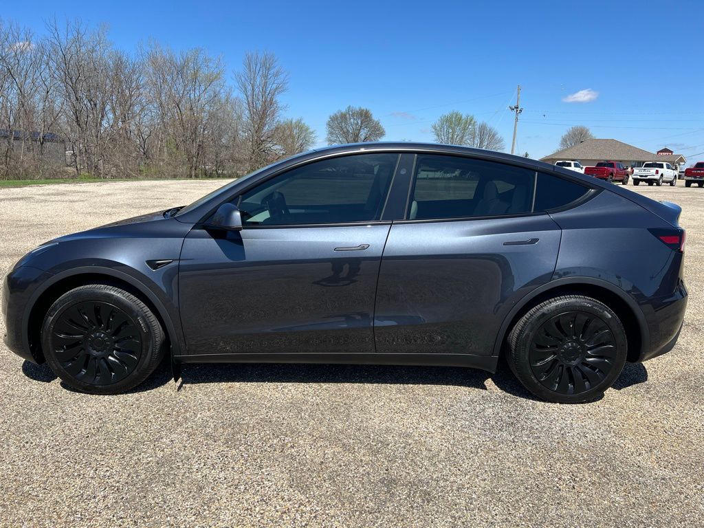 Used 2024 Tesla Model Y Long Range with VIN 7SAYGDEE7RA238243 for sale in Canton, IL