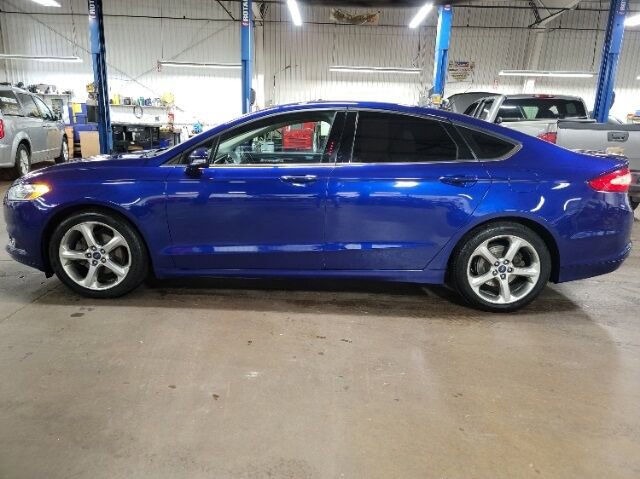 Used 2015 Ford Fusion SE with VIN 3FA6P0H77FR110792 for sale in Canton, IL