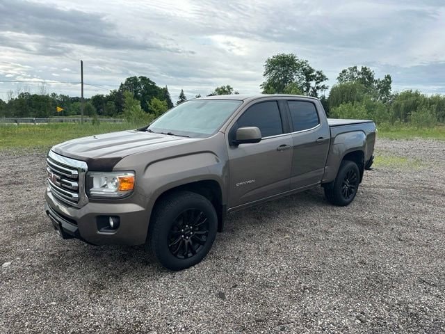 Used 2015 GMC Canyon SLE with VIN 1GTG6BE39F1187009 for sale in Chelsea, MI