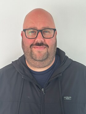 Staff member Cade Hagen from 64e362759387