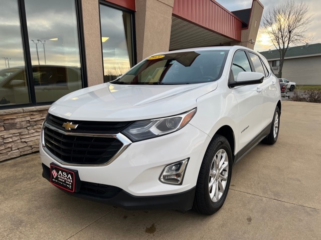 Used 2021 Chevrolet Equinox LT with VIN 3GNAXUEV1MS128992 for sale in Austin, Minnesota