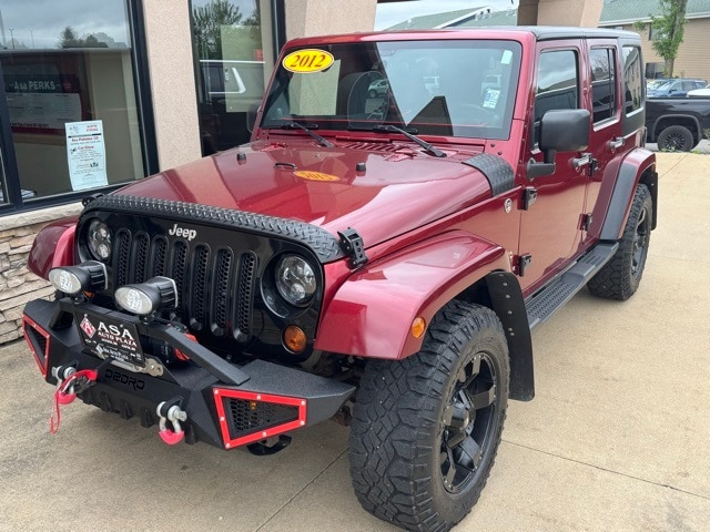 Used 2012 Jeep Wrangler Unlimited Sahara with VIN 1C4BJWEG5CL183350 for sale in Austin, Minnesota