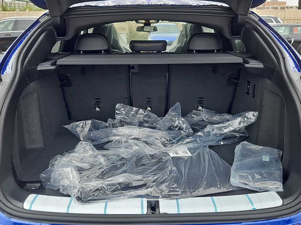 new 2025 BMW X4 M car, priced at $94,415