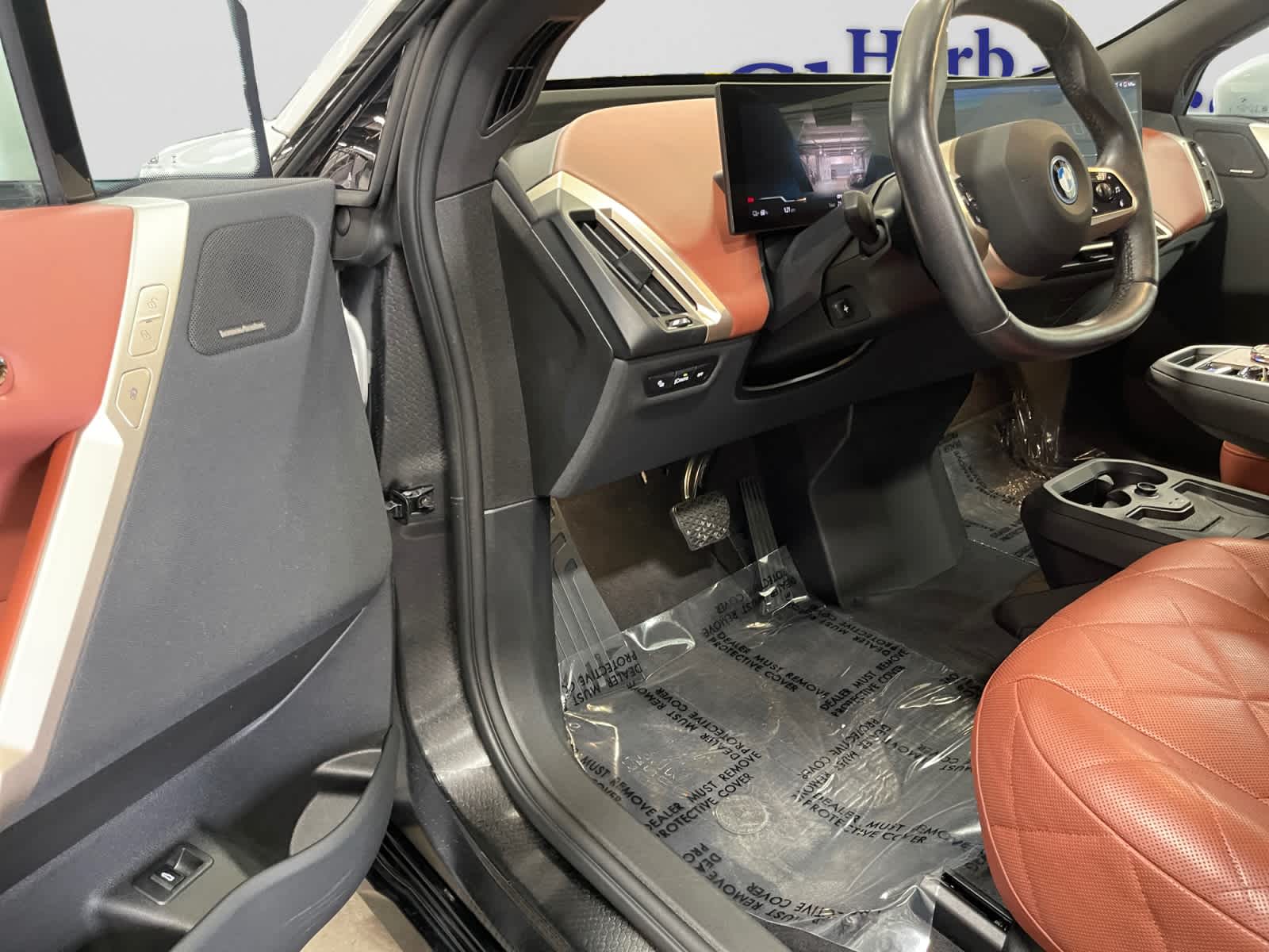 used 2024 BMW iX car, priced at $57,497