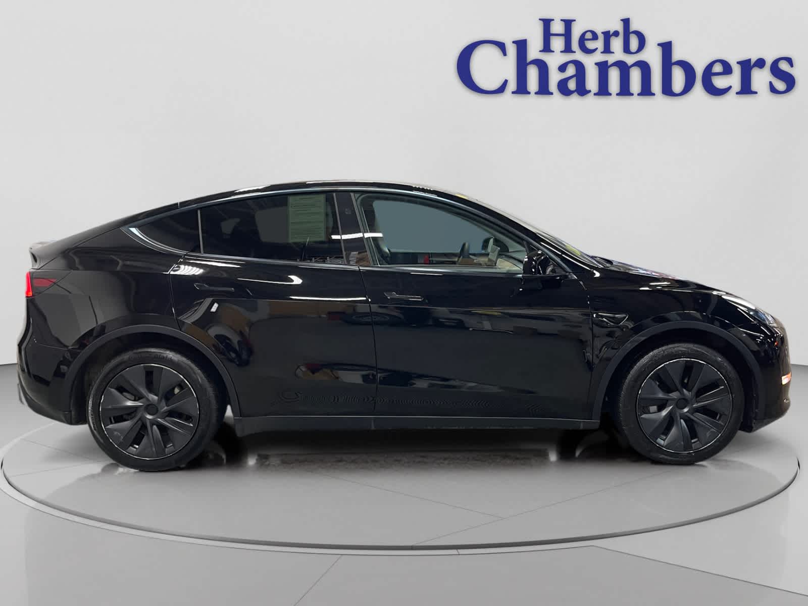 used 2025 Tesla Model Y car, priced at $38,497
