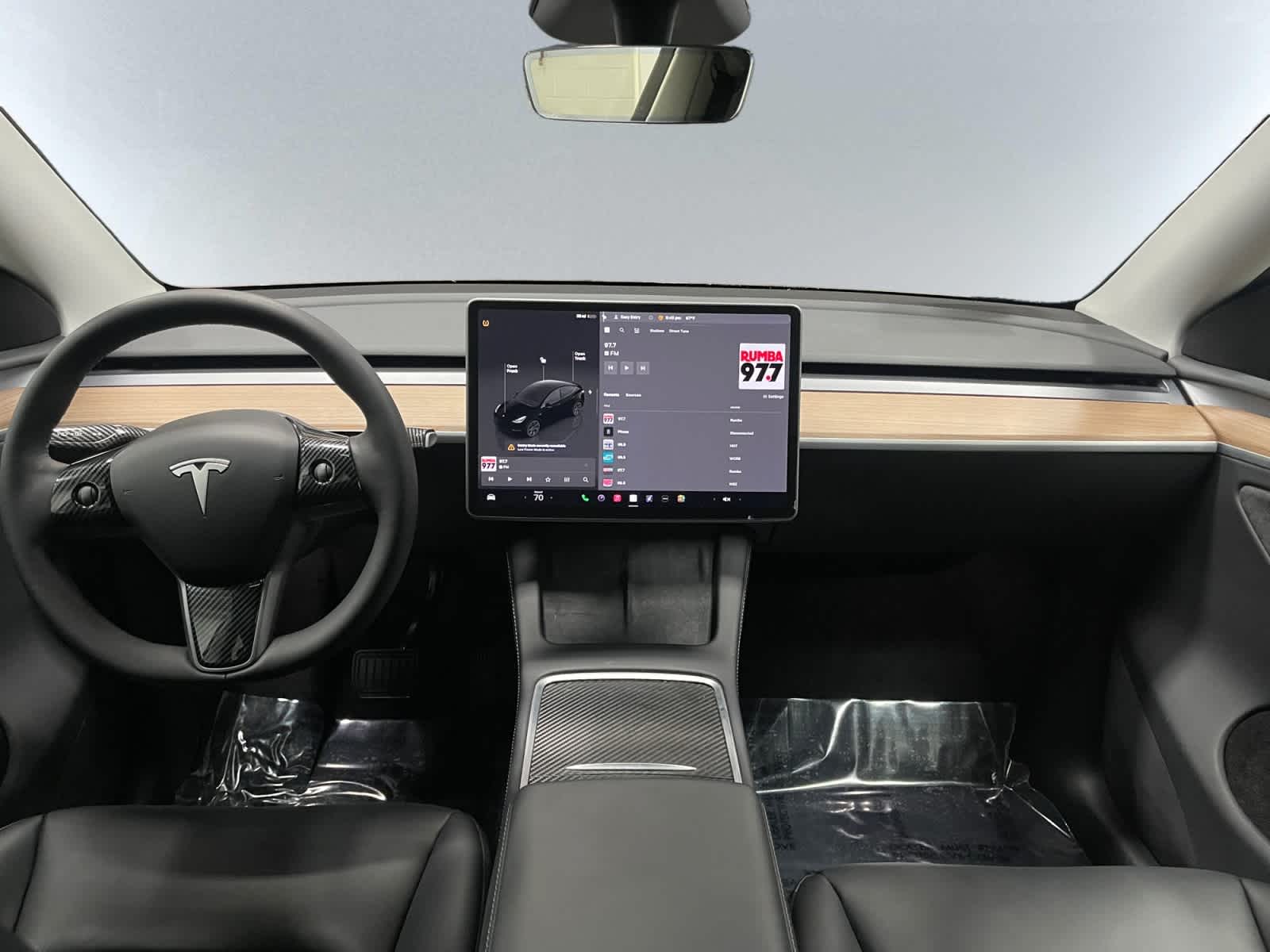 used 2025 Tesla Model Y car, priced at $38,497