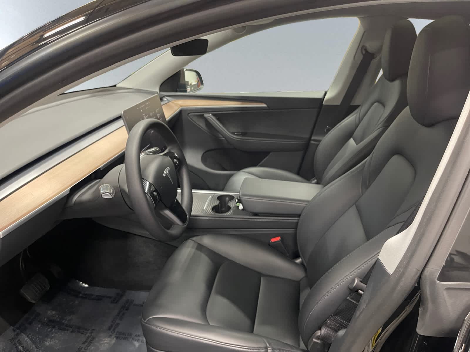 used 2025 Tesla Model Y car, priced at $38,497