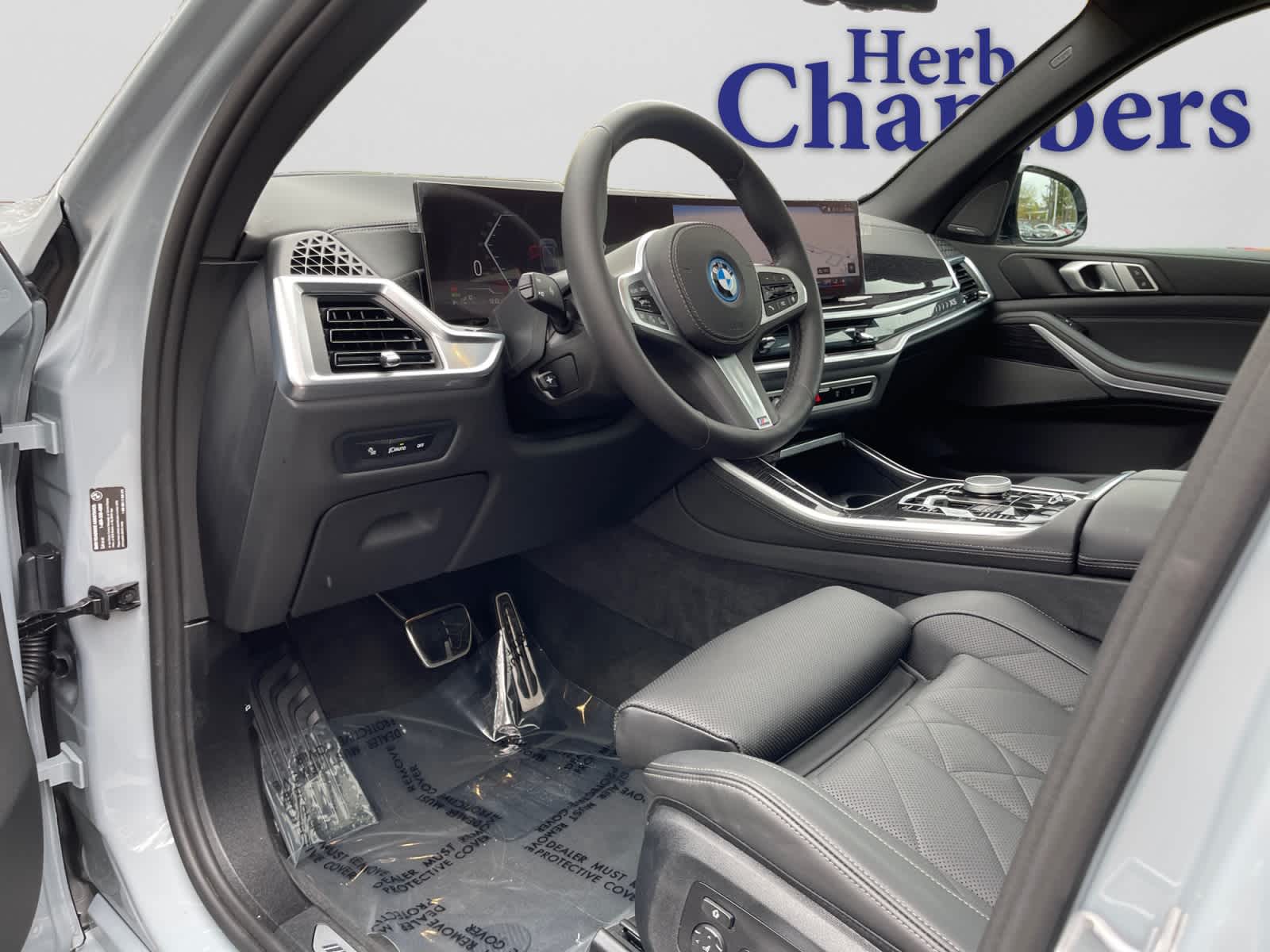 used 2025 BMW X5 PHEV car, priced at $67,297