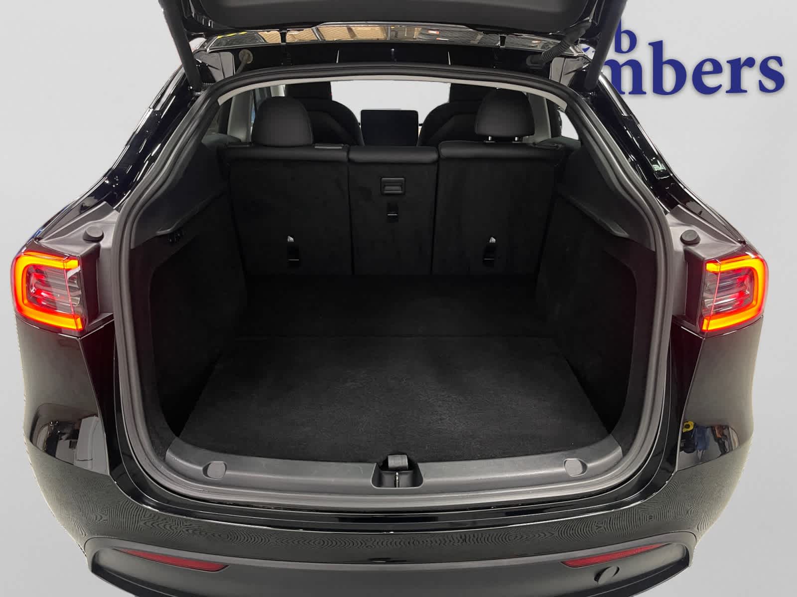 used 2025 Tesla Model Y car, priced at $38,497