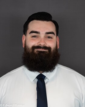 Staff member Travis Ewen from ID_fde6e0