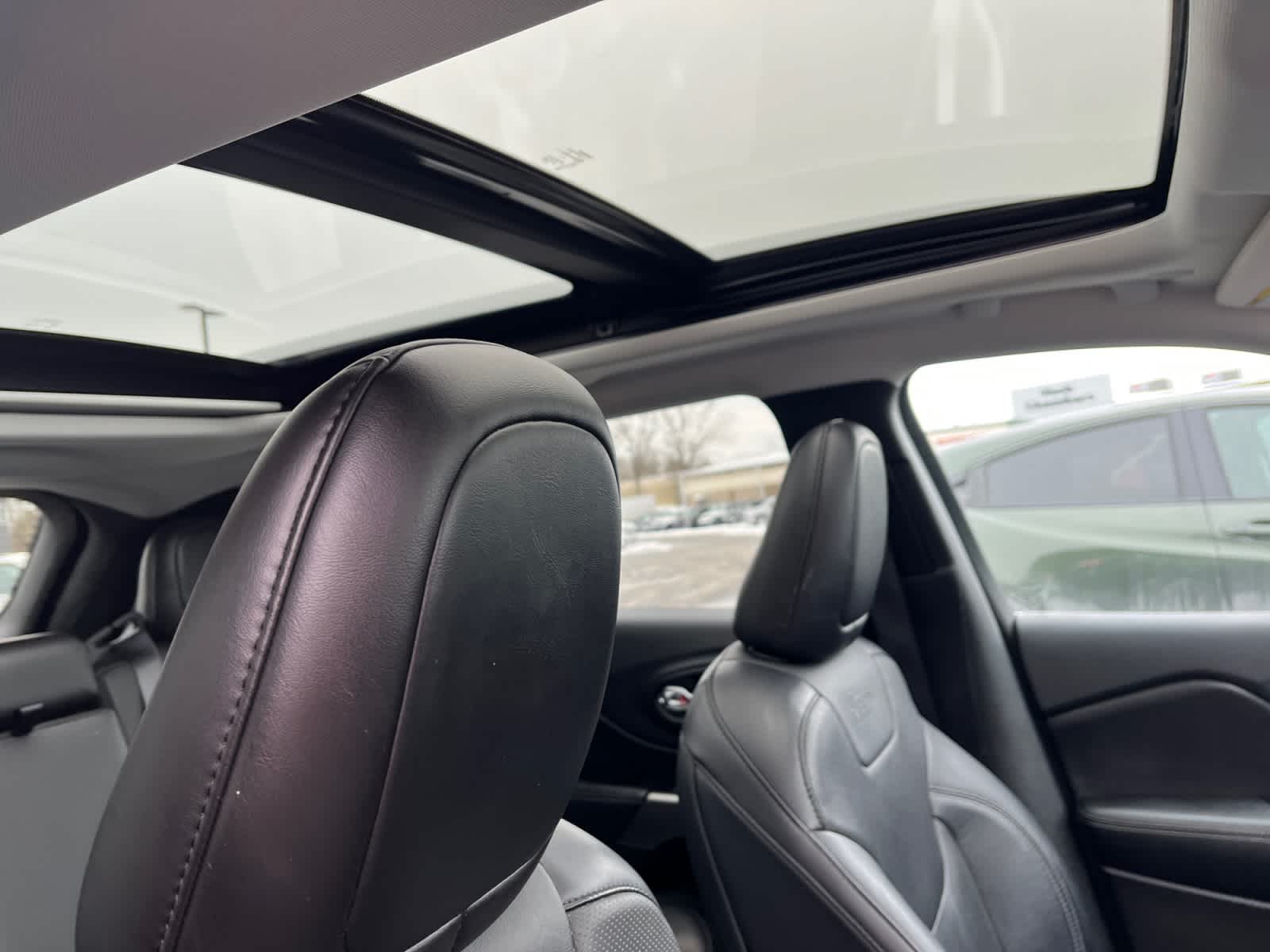 used 2021 Jeep Cherokee car, priced at $22,502