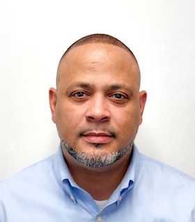 Staff member George Sanchez from ID_a6478b