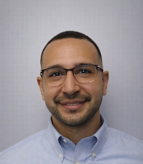 Staff member Islam "Izzy" Elgohary  from ID_a6478b