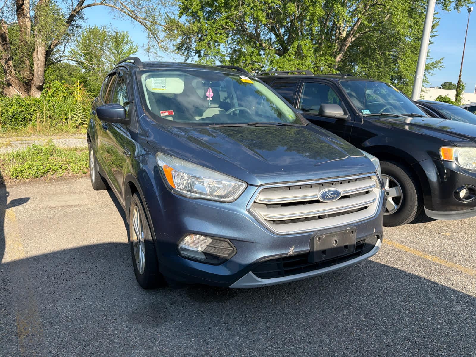 Used 2018 Ford Escape SE with VIN 1FMCU9GD0JUA93168 for sale in Seekonk, MA