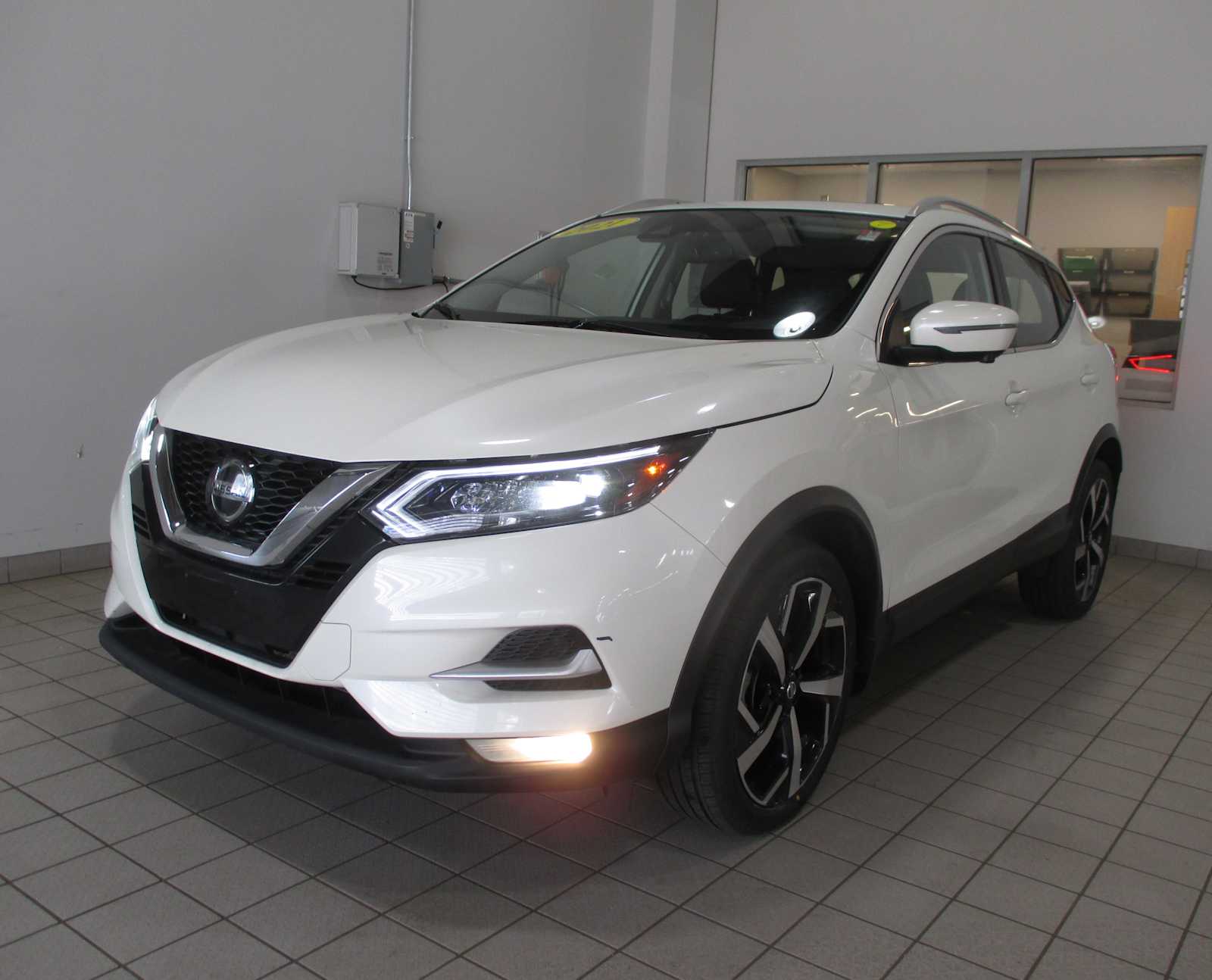 used 2021 Nissan Rogue Sport car, priced at $15,998