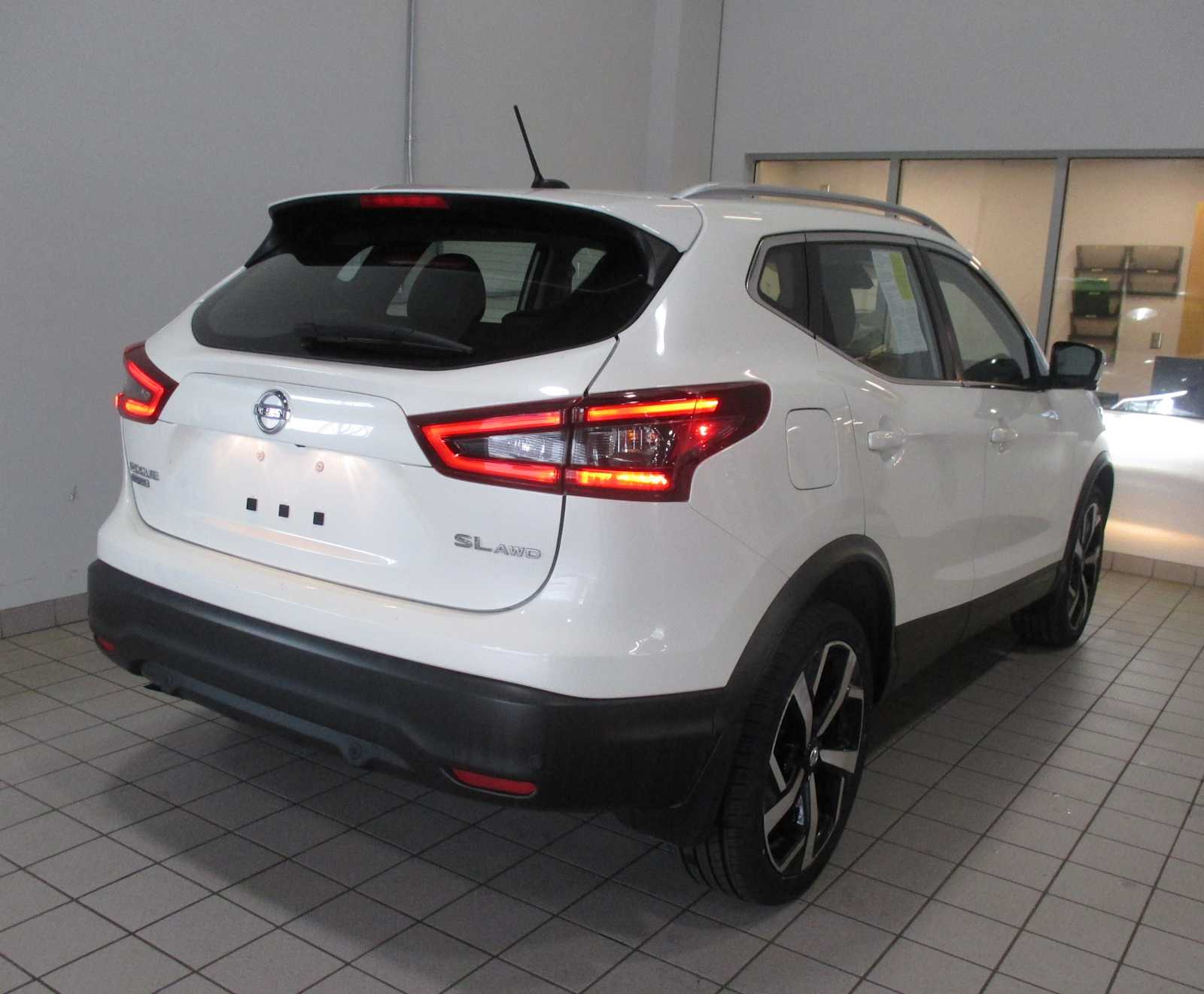 used 2021 Nissan Rogue Sport car, priced at $15,998