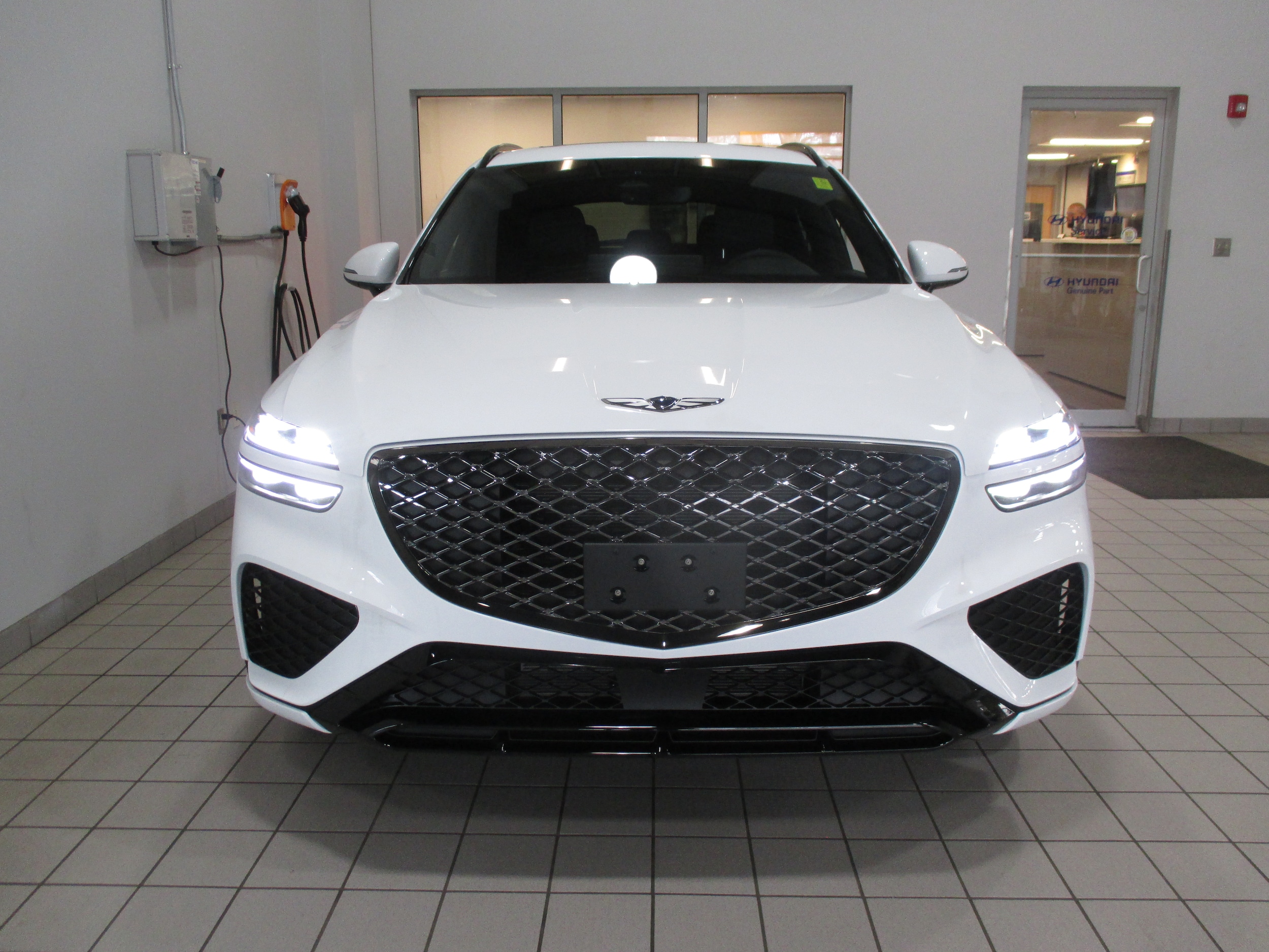 used 2025 Genesis GV70 car, priced at $54,905