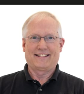 Staff member Christopher Grosse from ID_8f532f