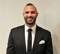 Staff member MARCUS KARAM from ID_915f1b