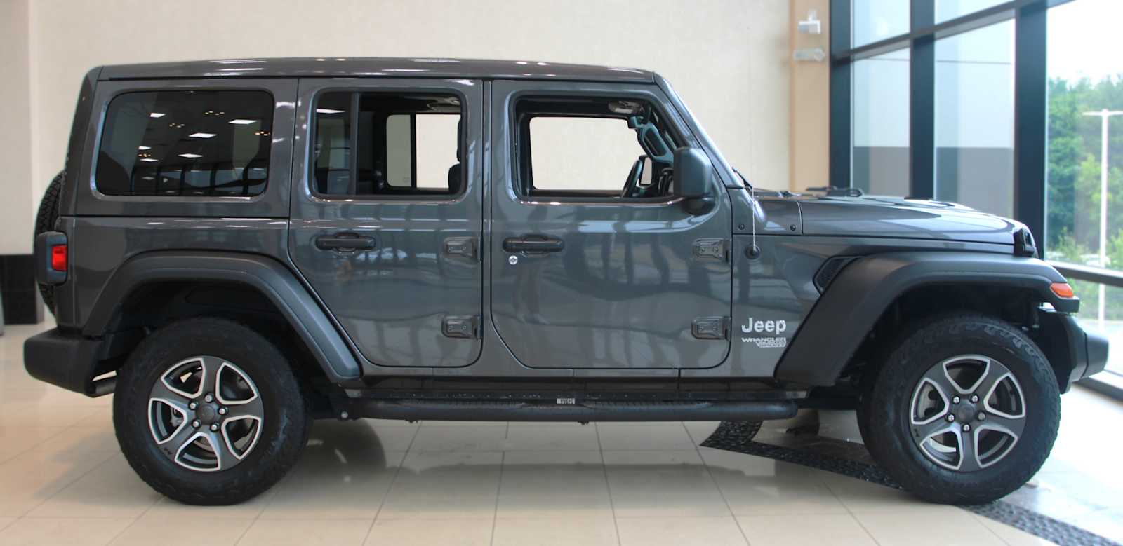 used 2021 Jeep Wrangler car, priced at $27,297