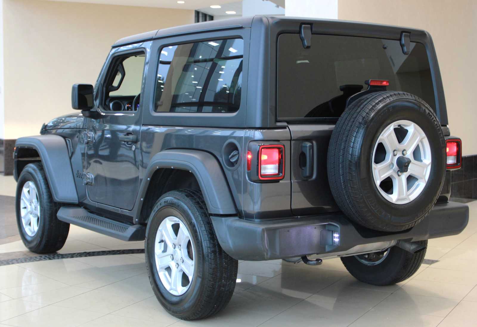 used 2022 Jeep Wrangler car, priced at $27,297