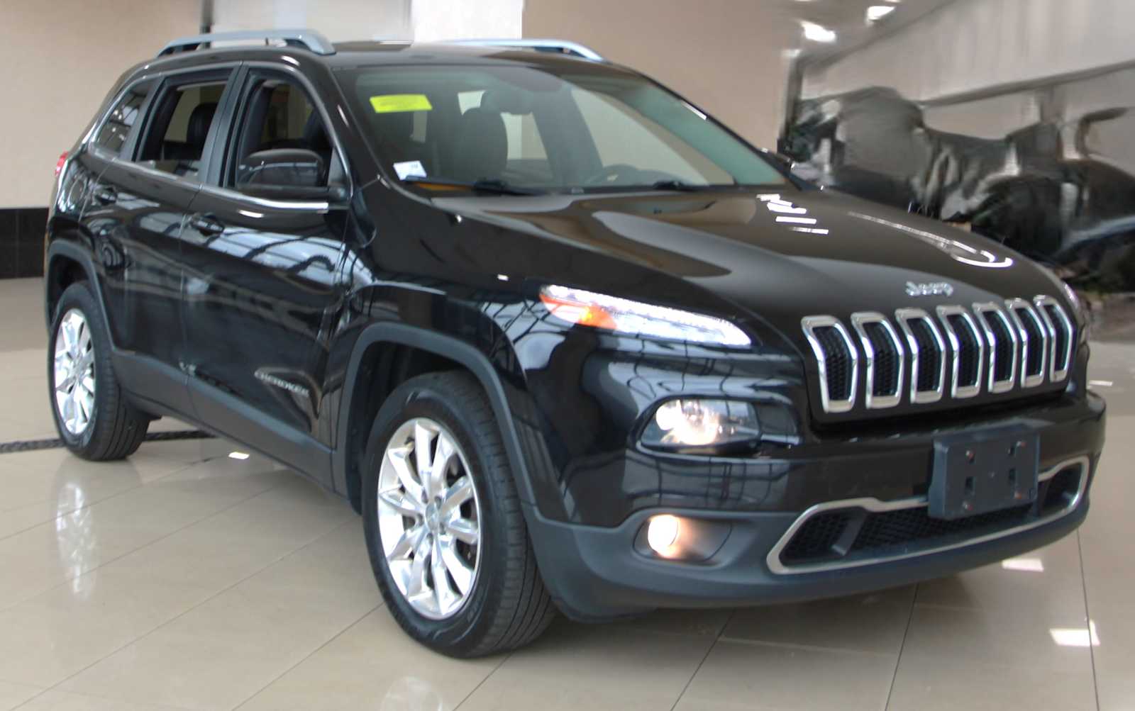 used 2015 Jeep Cherokee car, priced at $10,497