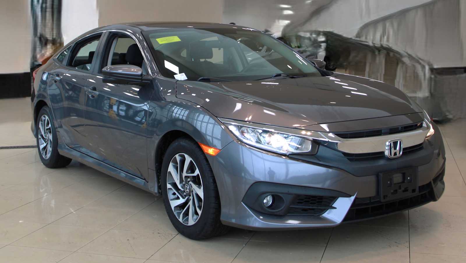 used 2016 Honda Civic car, priced at $17,097