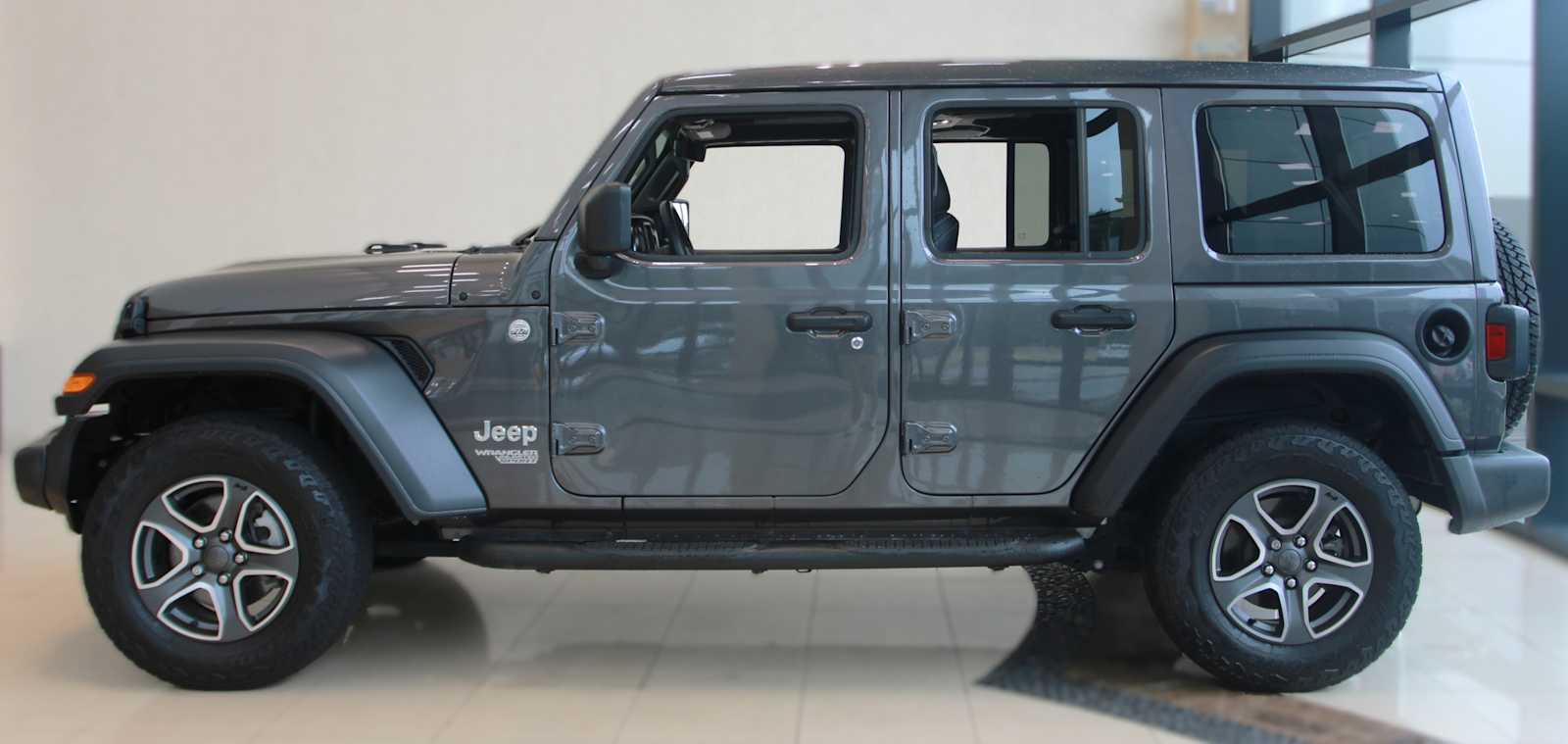 used 2021 Jeep Wrangler car, priced at $27,297