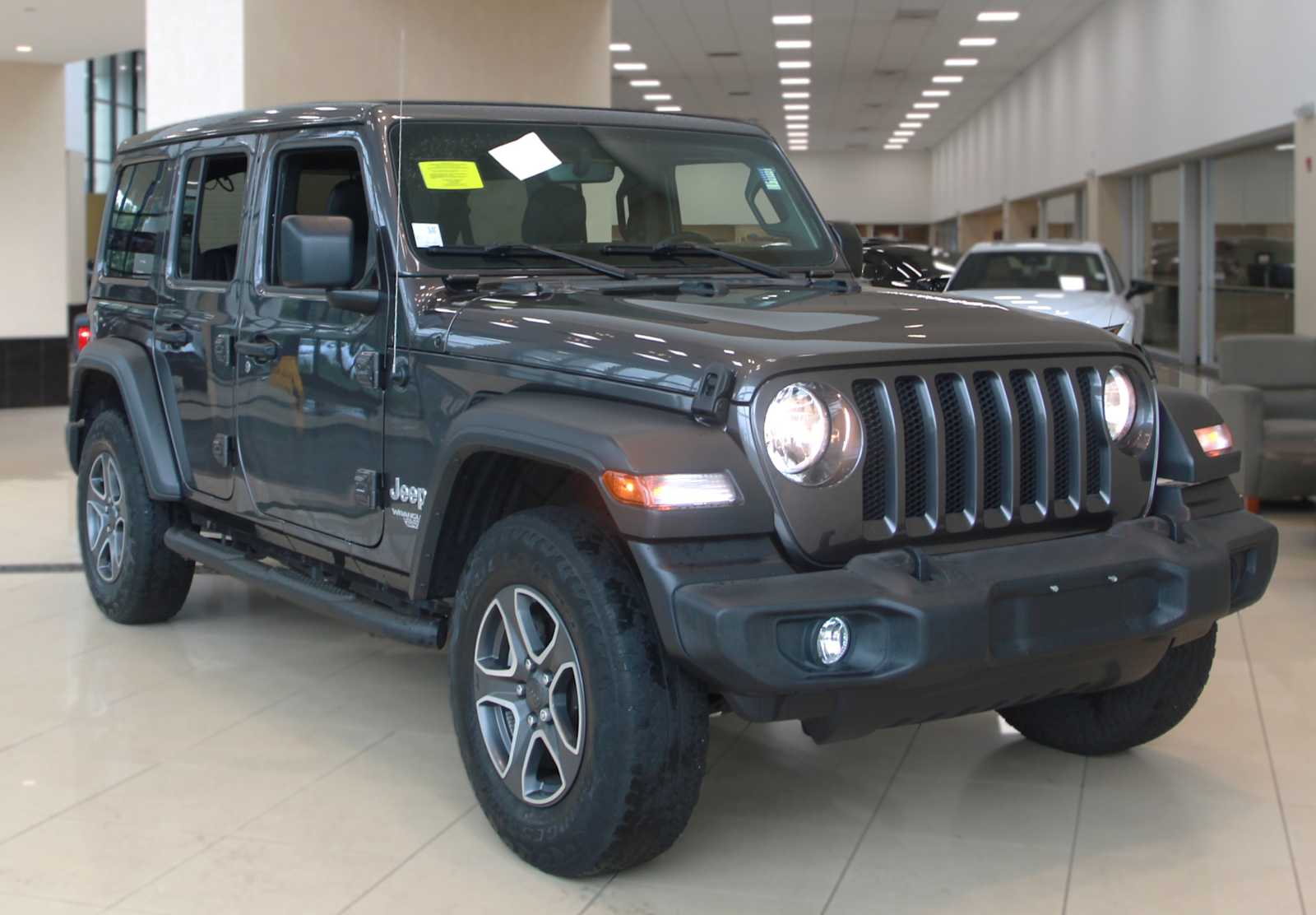 used 2021 Jeep Wrangler car, priced at $27,297