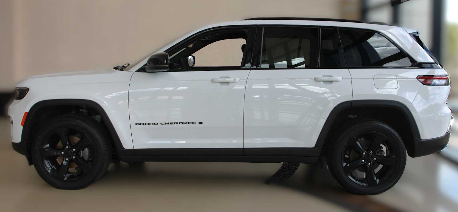 used 2023 Jeep Grand Cherokee car, priced at $30,497