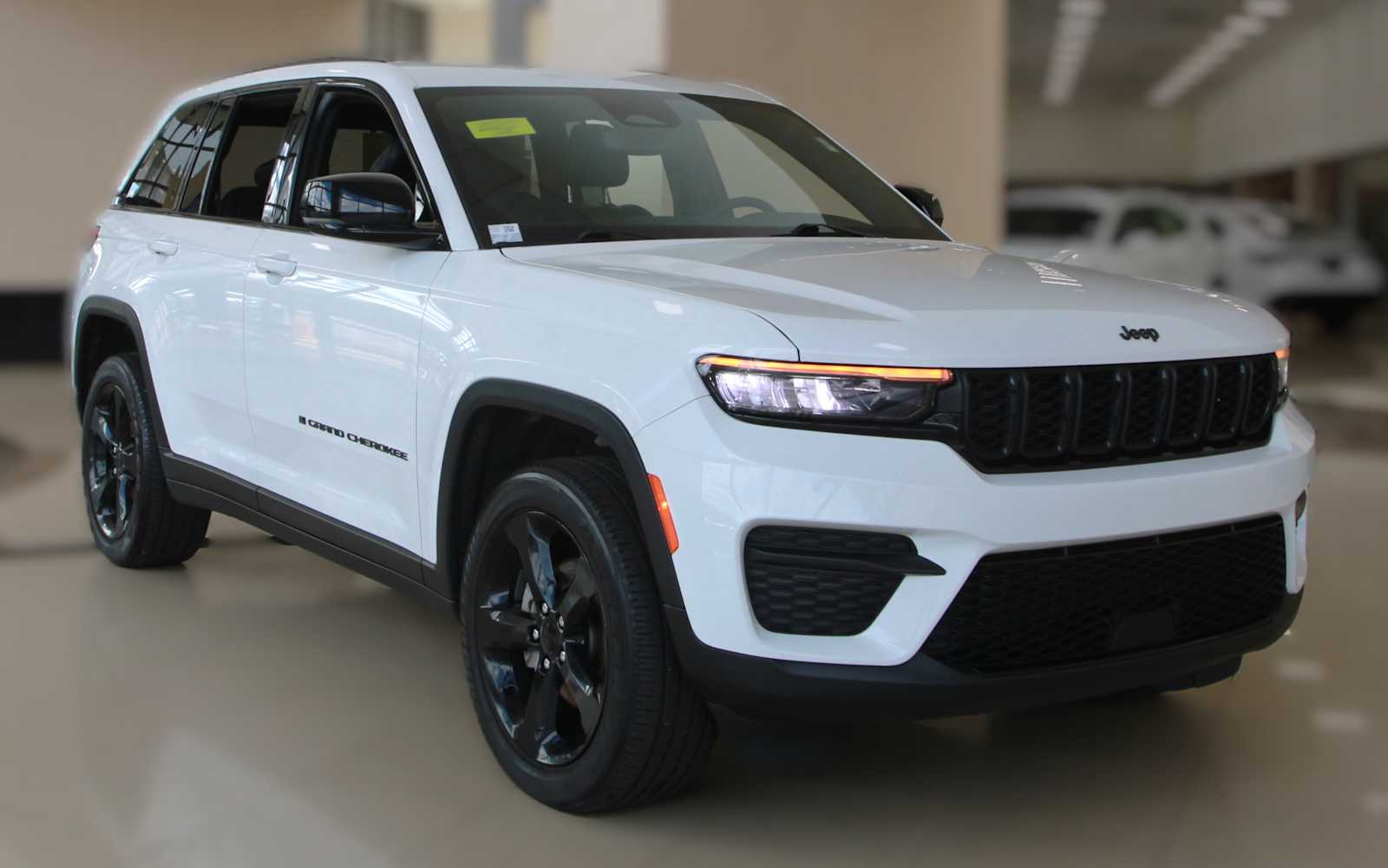 used 2023 Jeep Grand Cherokee car, priced at $30,497