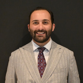 Staff member Andrew Schlageter from ID_7d7455