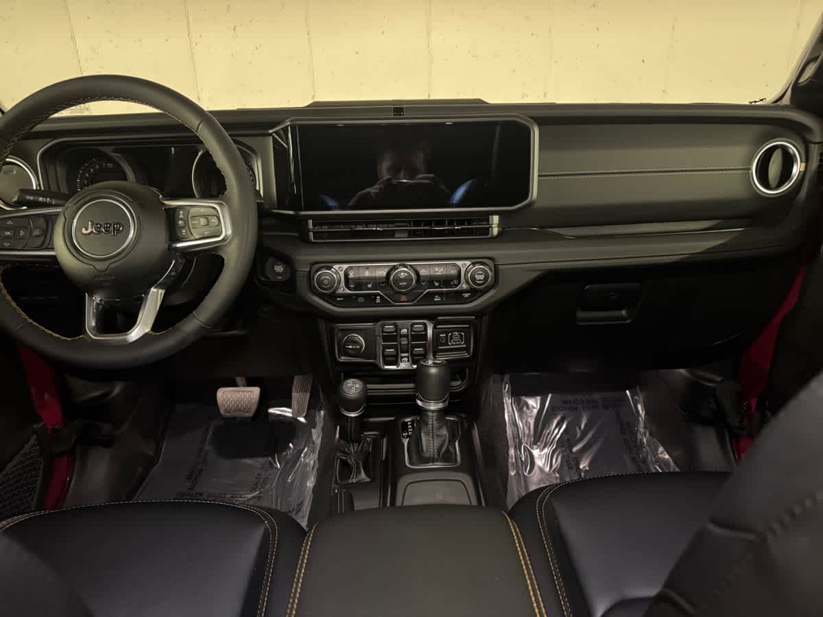 used 2024 Jeep Wrangler 4xe car, priced at $33,698