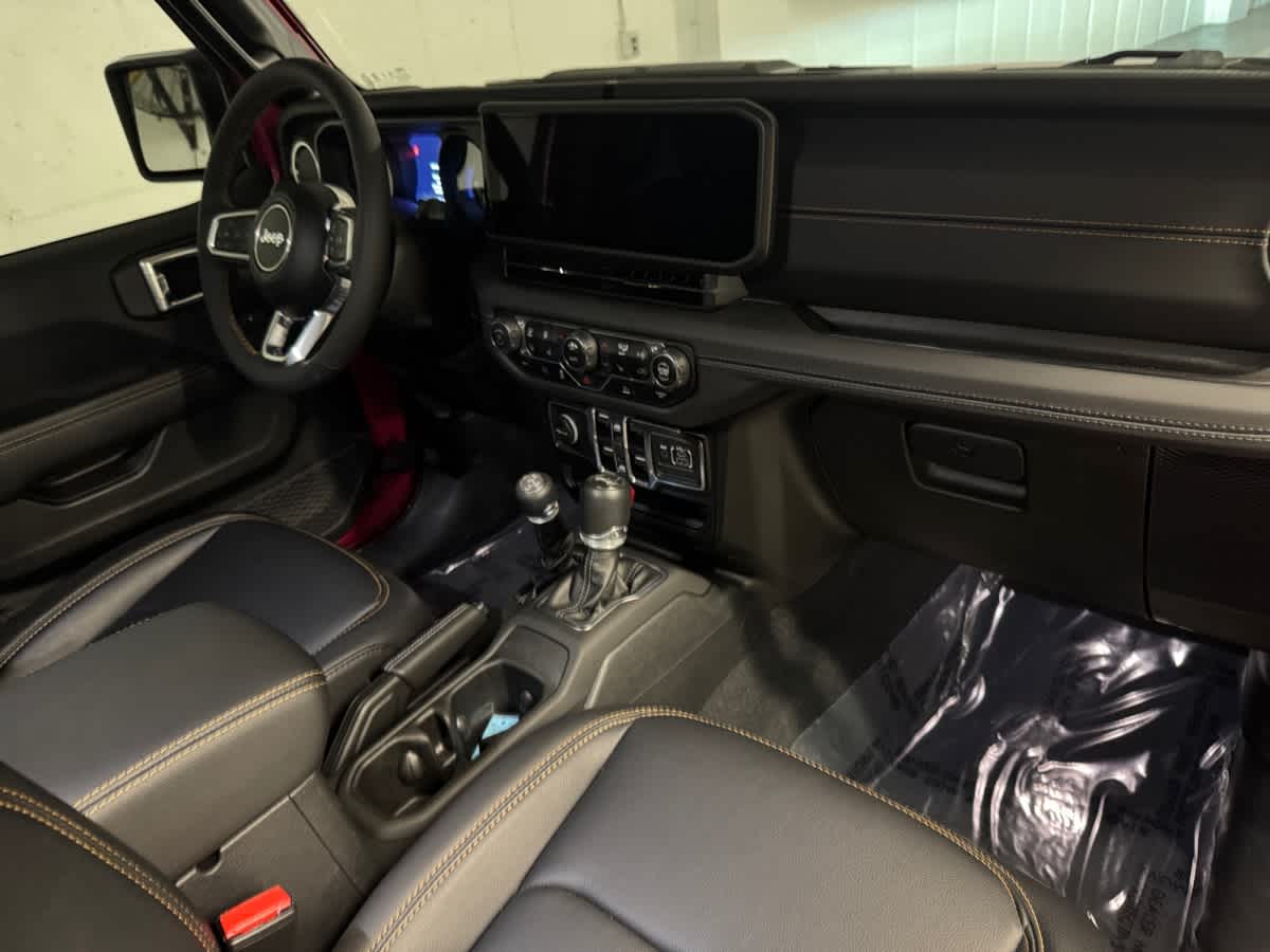 used 2024 Jeep Wrangler 4xe car, priced at $33,698