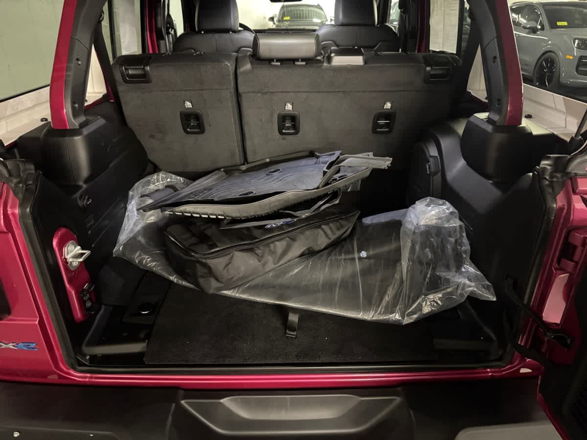 used 2024 Jeep Wrangler 4xe car, priced at $33,698